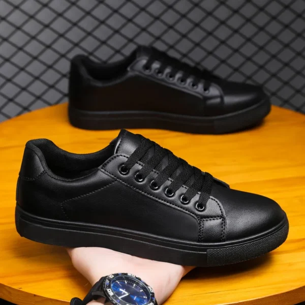 Zapatos blancos y negros para hombre, cómodos zapatos informales para monopatín, zapatillas de ocio sólidas para hombre, zapatos ligeros para caminar - Imagen 2