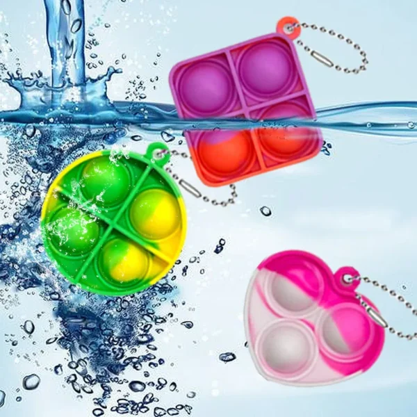 Juguetes Pop Fidget, Mini llaveros Pop, juguetes para niños pequeños, paquete de juguetes sensoriales, paquetes a granel para reducir la presión, regalos de recuerdo de fiesta 30 Uds. - Imagen 3